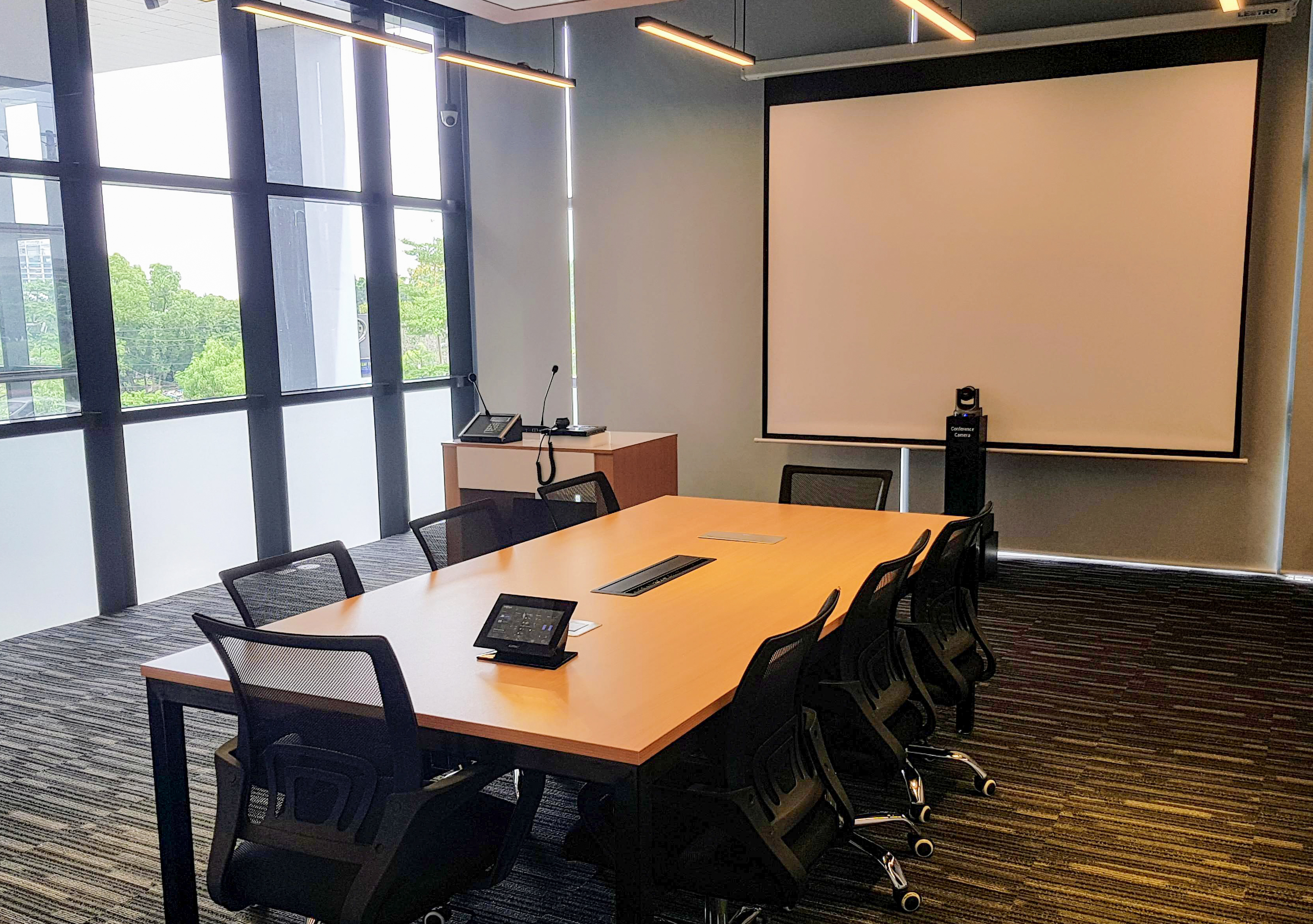 A Q-SYS Demo conference room with
