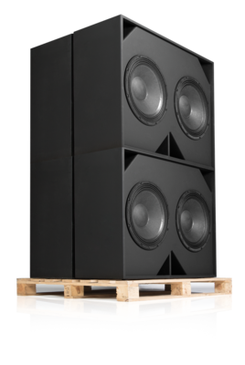 The QSC SB-2180 Compact Subwoofer sitting on top of a wooden pallet