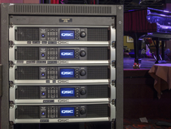 View 5 of QSC Amplifiers inside an AV rack