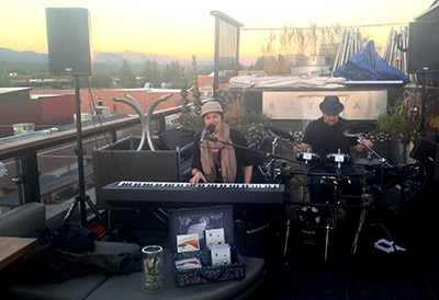 Erin &amp; The Project performing on top of a building
