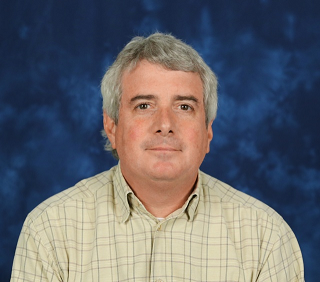 Headshot of John White