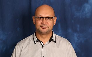 headshot of Polisi “Fitz” Fitisemanu
